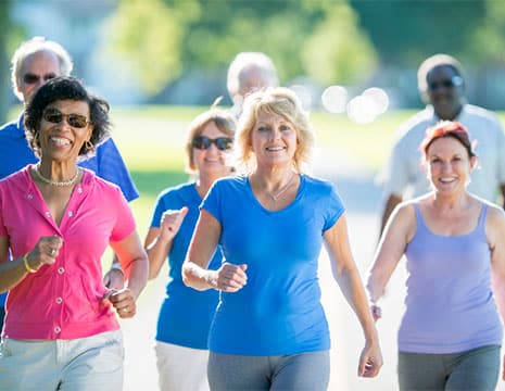 Group of Women Walking After Chronic Pain Treatment near Utica MI