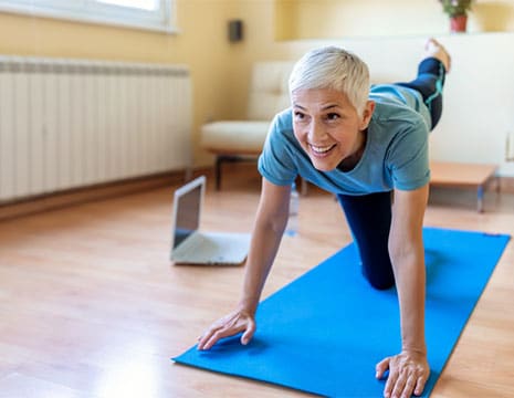 Woman Stretching After Visiting A Pain Management Doctor near Oakland County