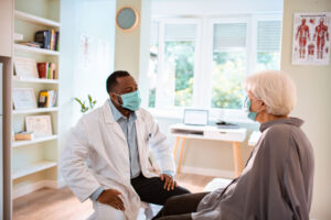 Doctor with Patient wearing a mask