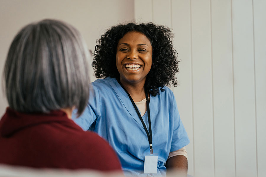 Nurse and Patient Discussing Regenerative Orthobiologics near Troy MI